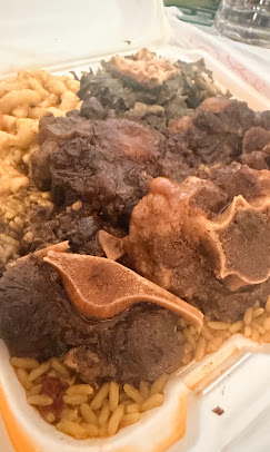 Oxtail over yellow rice