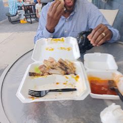A happy customer enjoying a meal at The Canopy 18
